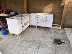 Kitchen cabinets before striping/painting