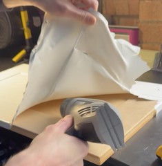Stripping the plastic coating using a heat gun