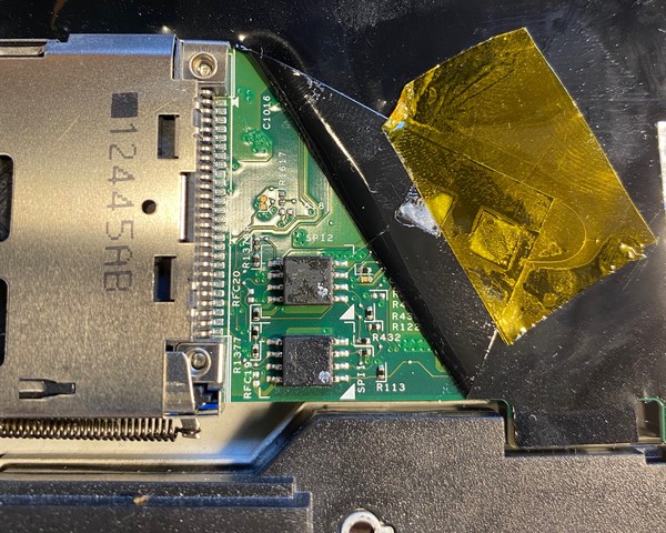 The 2 EEPROMs revealed, near the ExpressCard slot
