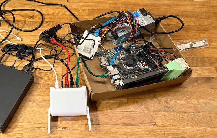 The messy test setup outside. Yes, I know the fans are blocked in the picture. Oops!